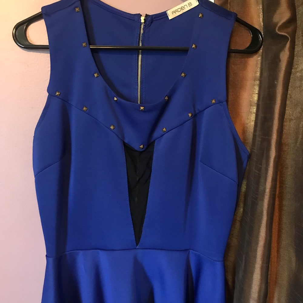 Arden B. Mesh panel peplum top.